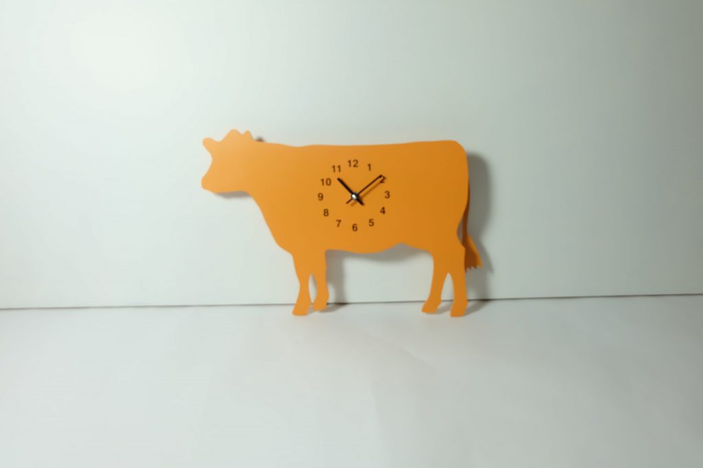 The Labrador Co.-Orange Cow Clock with wagging tail - last one!